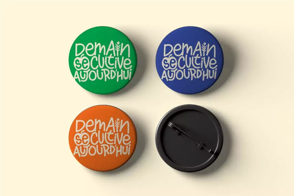 Badges aux motifs agricoles normands